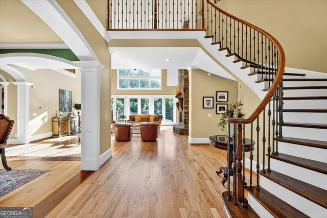 a large kitchen with a table and chairs