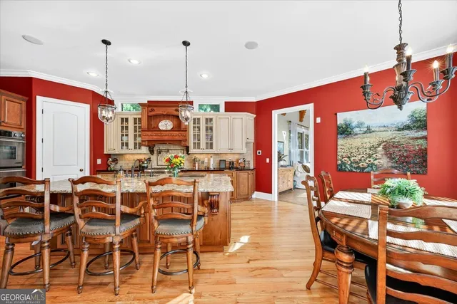 a bathroom with a toilet a sink and a mirror