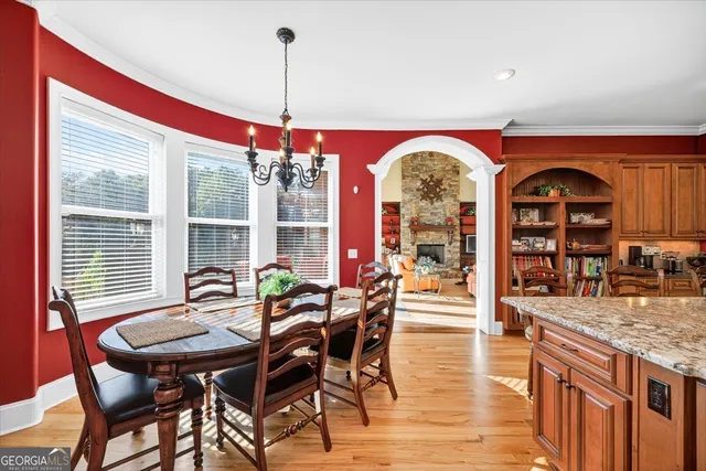 a hall way with furniture and a rug