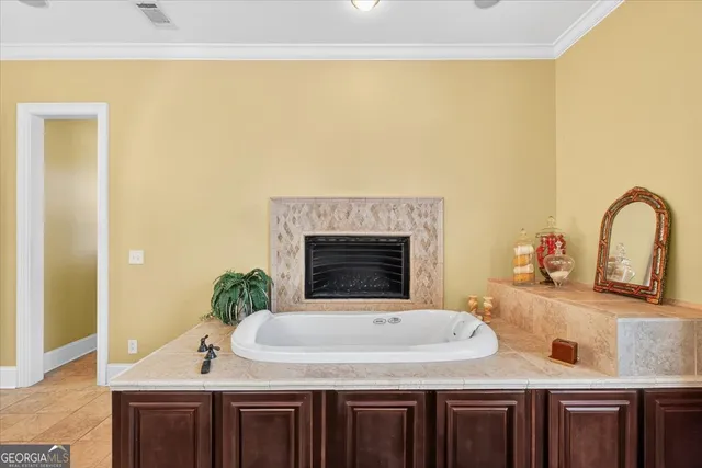 a room with furniture and pool tables