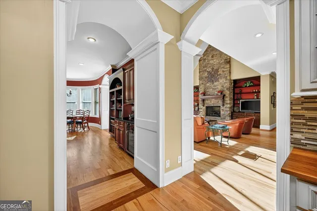 a view of a swimming pool with lawn chairs and a yard