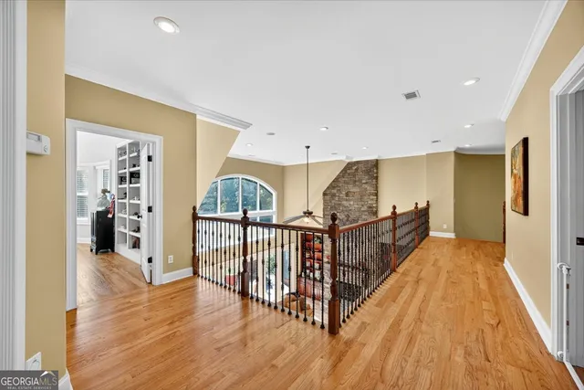 a view of kitchen with furniture and wooden floor