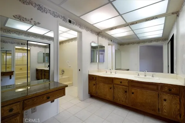 a bathroom with a bathtub and shower