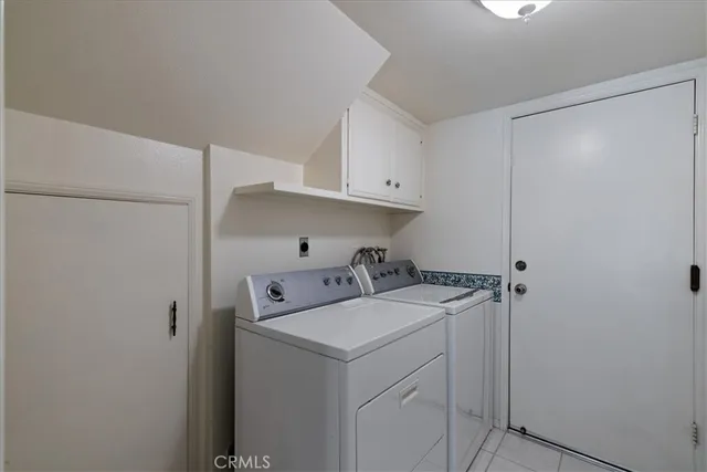 a view of a house with backyard and porch
