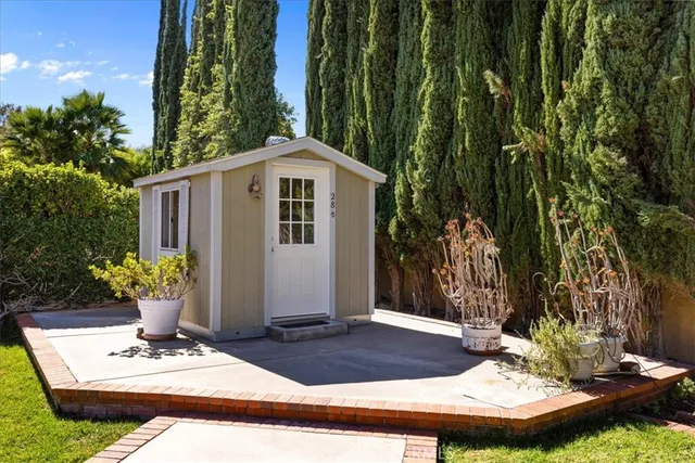 a view of a wooden door and wooden floor