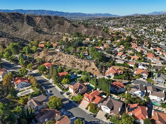 an aerial view of a house with a garden
