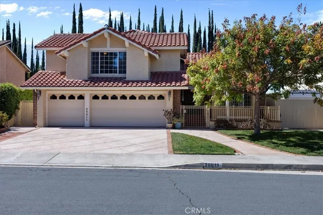 a view of a porch with a table and chairs