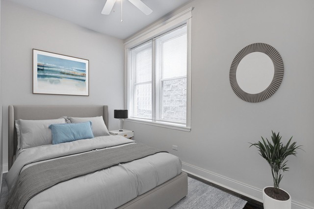 2633 West Haddon Avenue, Unit 3F Chicago, IL 60622 - Photo 6 of 12 a living room with furniture and a potted plant