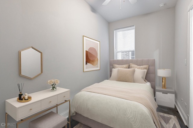 2633 West Haddon Avenue, Unit 3F Chicago, IL 60622 - Photo 8 of 12 a bedroom with a bed and a bathroom