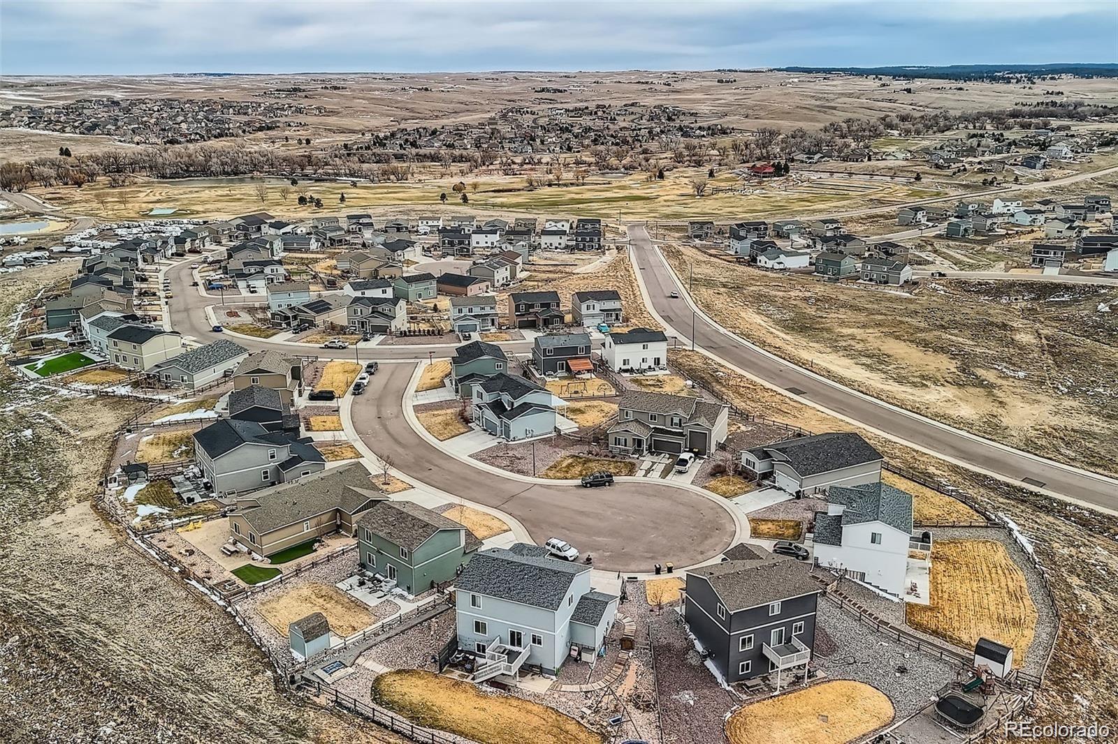 4807 River Highlands Loop Elizabeth, CO 80107 - Photo 31 of 37 an aerial view of a house with a ocean view