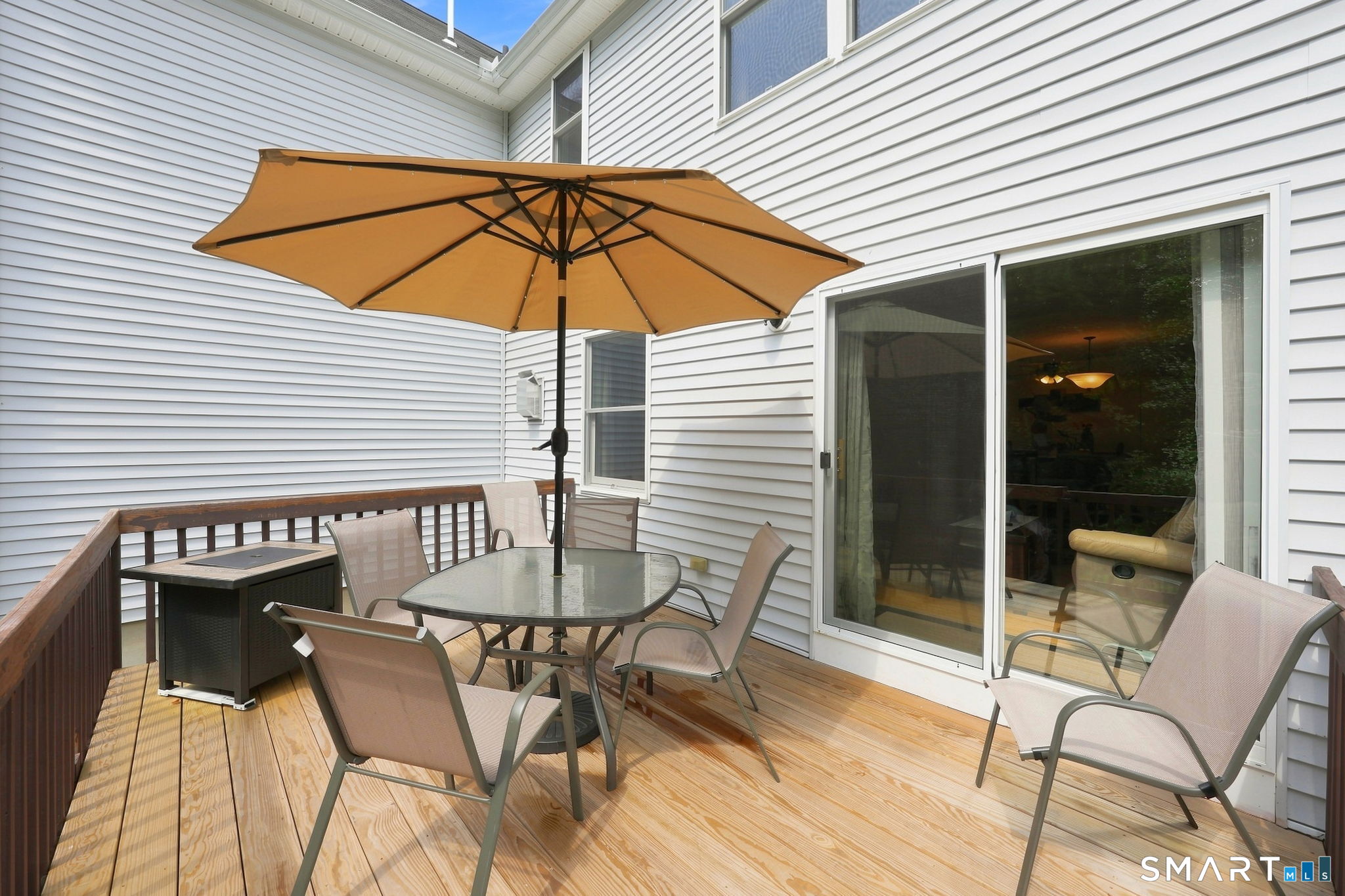 18 Folkstone Road, Unit D East Windsor, CT 06016 - Photo 16 of 36 Backyard deck