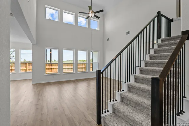 a view of an entryway with wooden floor
