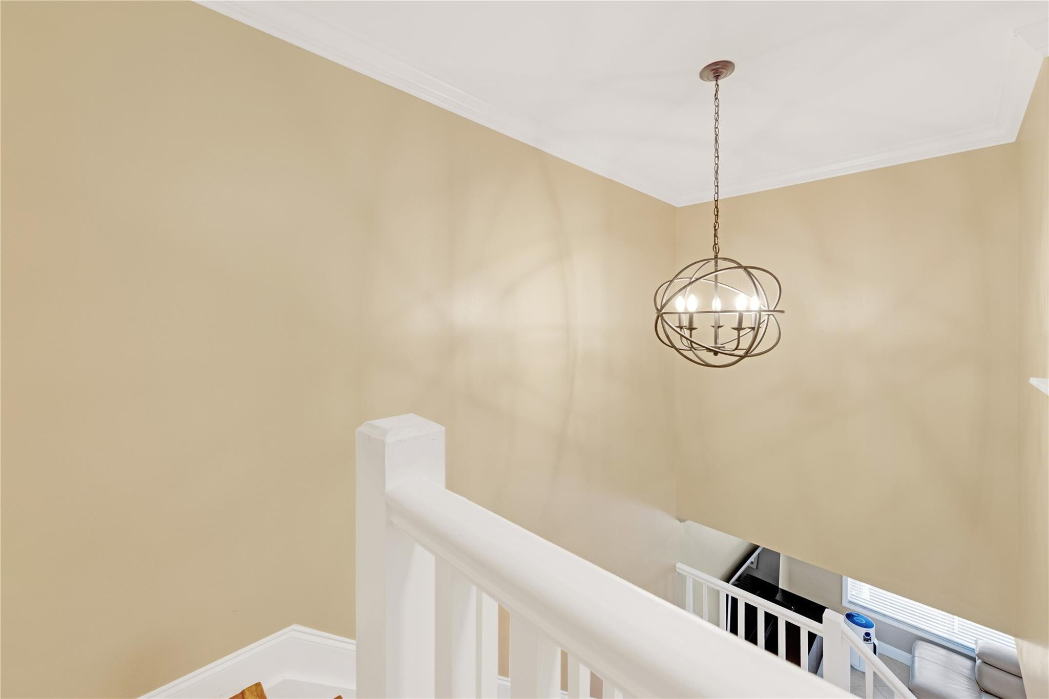 8310 Via Leonessa Boca Raton, FL 33433 - Photo 15 of 29 a view of a hallway with a chandelier