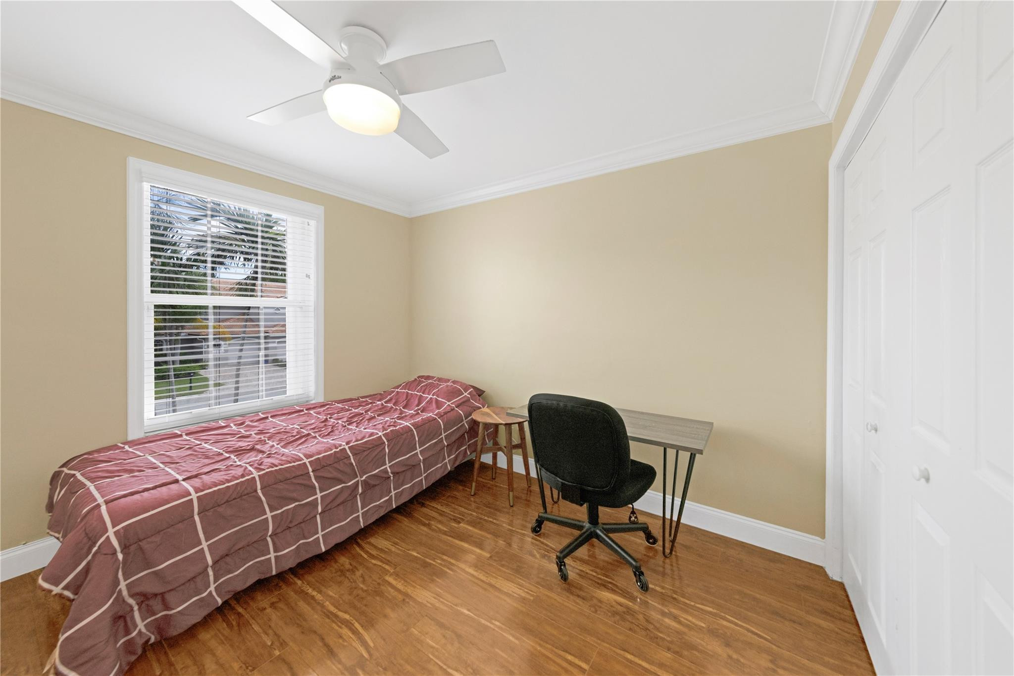 8310 Via Leonessa Boca Raton, FL 33433 - Photo 20 of 29 a bedroom with a bed chair and a window
