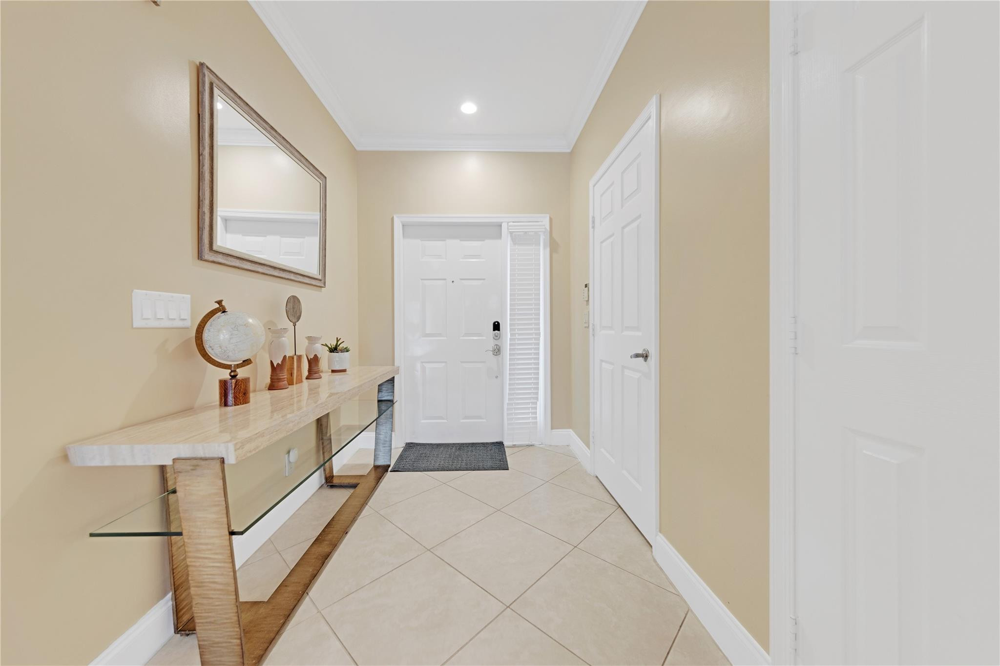 8310 Via Leonessa Boca Raton, FL 33433 - Photo 2 of 29 a bathroom with a sink a mirror and a shower
