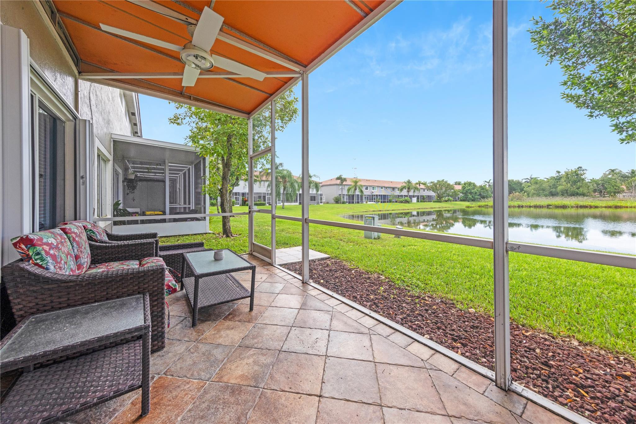 8310 Via Leonessa Boca Raton, FL 33433 - Photo 21 of 29 a house view with a outdoor seating space