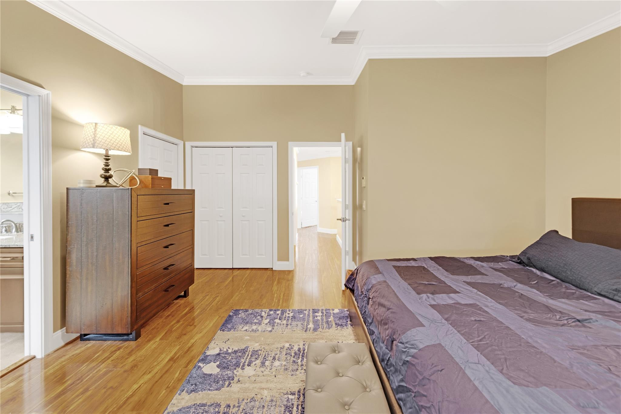 8310 Via Leonessa Boca Raton, FL 33433 - Photo 9 of 29 a bedroom with a bed and a dresser