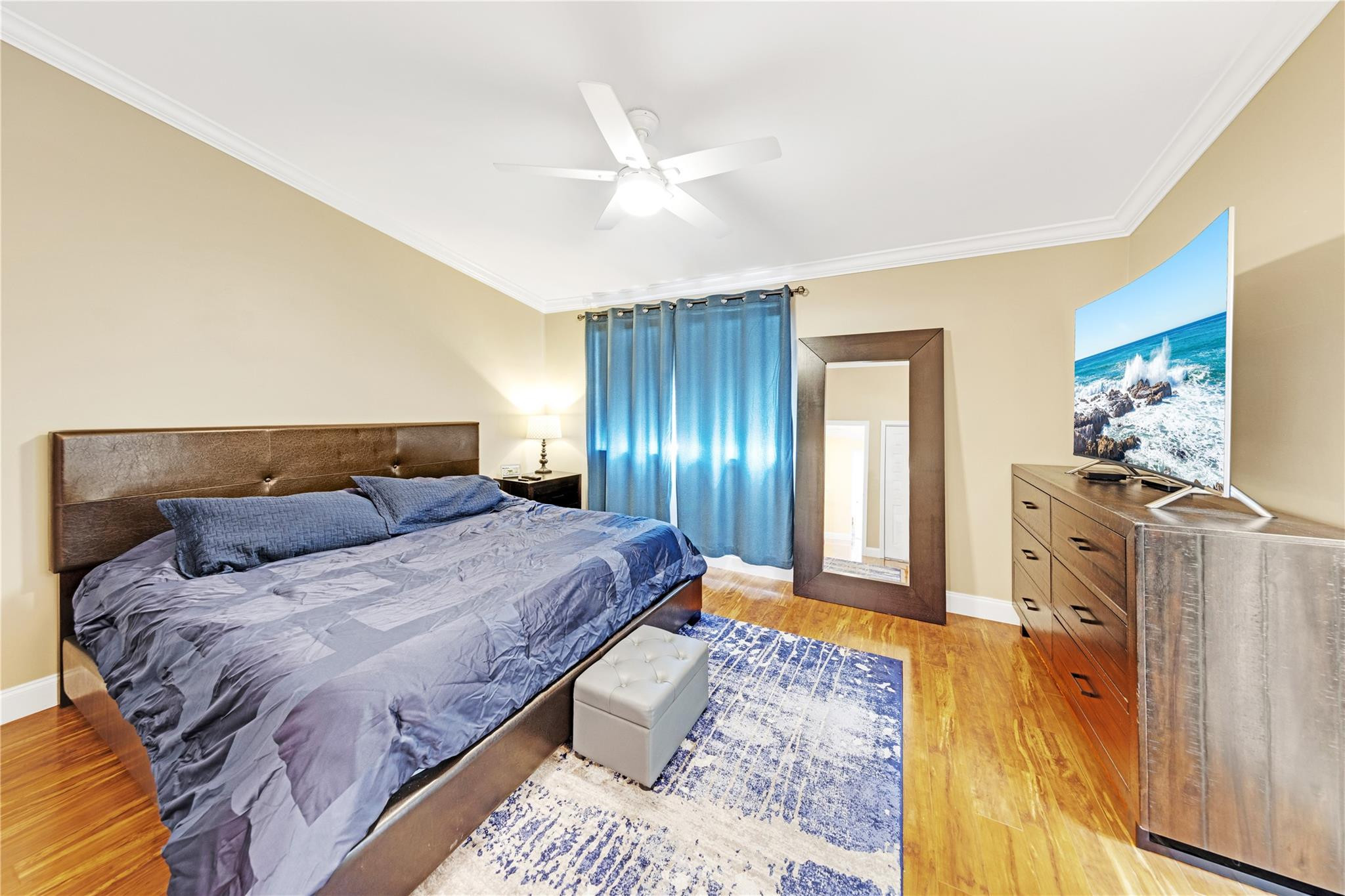 8310 Via Leonessa Boca Raton, FL 33433 - Photo 10 of 29 a bedroom with a bed and a mirror