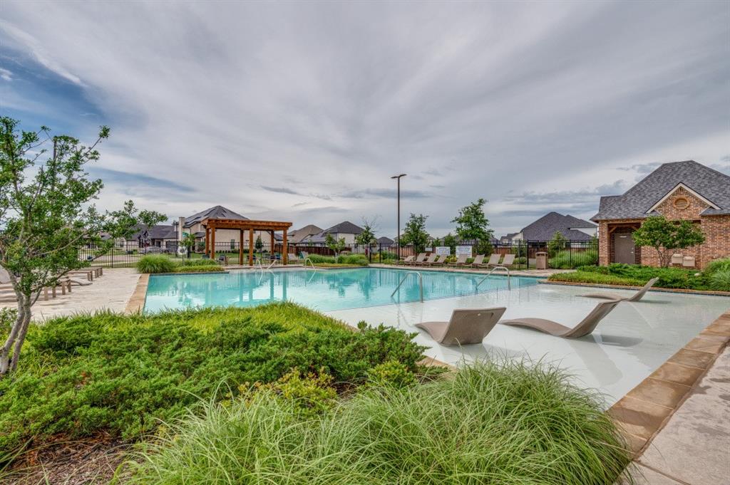 153 Arrow Wood Road Waxahachie, TX 75165 - Photo 28 of 29 Community pool with a gazebo and a patio area