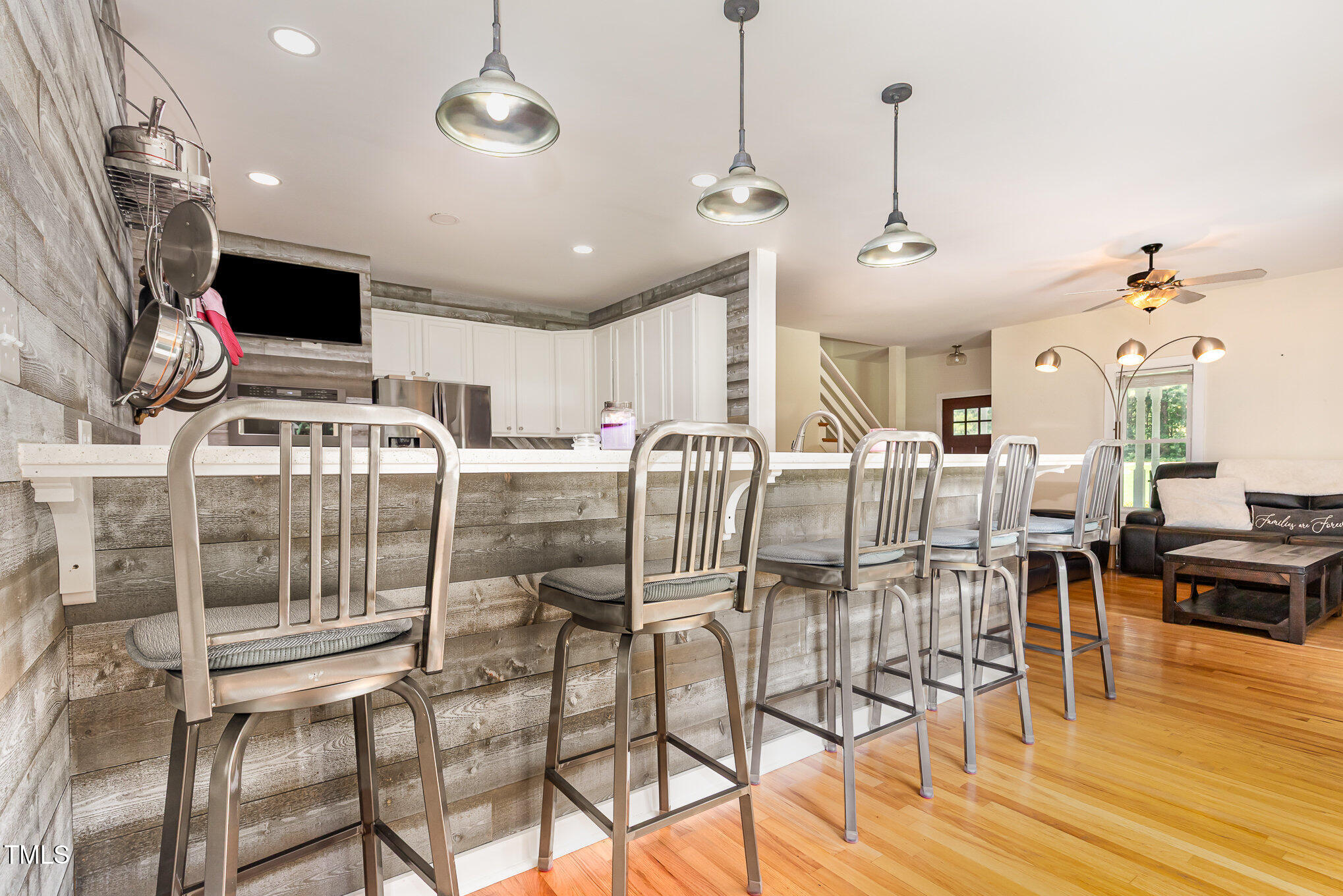 255 Morris Road Pittsboro, NC 27312 - Photo 11 of 40 a view of a dining room with furniture wooden floor and chandelier