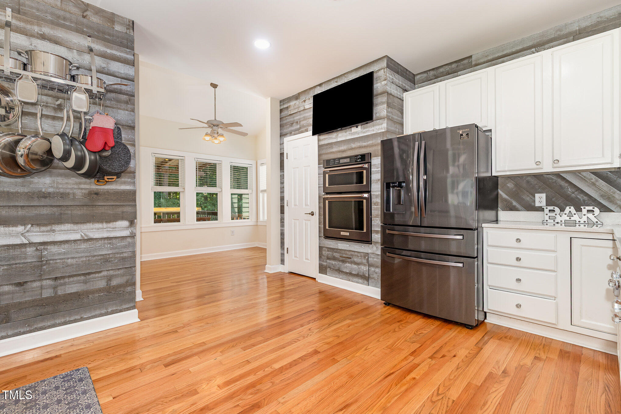 255 Morris Road Pittsboro, NC 27312 - Photo 13 of 40 a kitchen with stainless steel appliances kitchen island granite countertop a refrigerator stove and oven