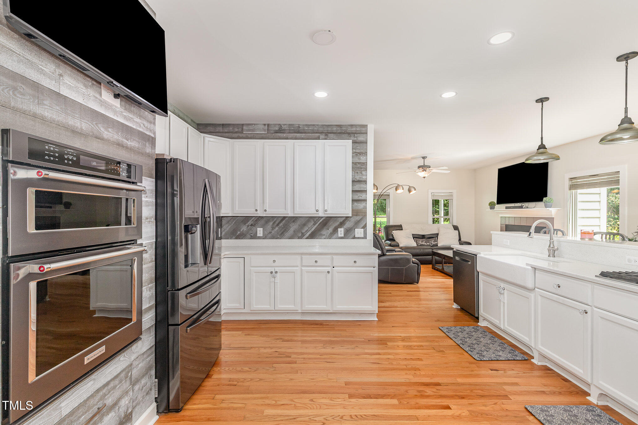 255 Morris Road Pittsboro, NC 27312 - Photo 14 of 40 a kitchen with a sink cabinets and stainless steel appliances