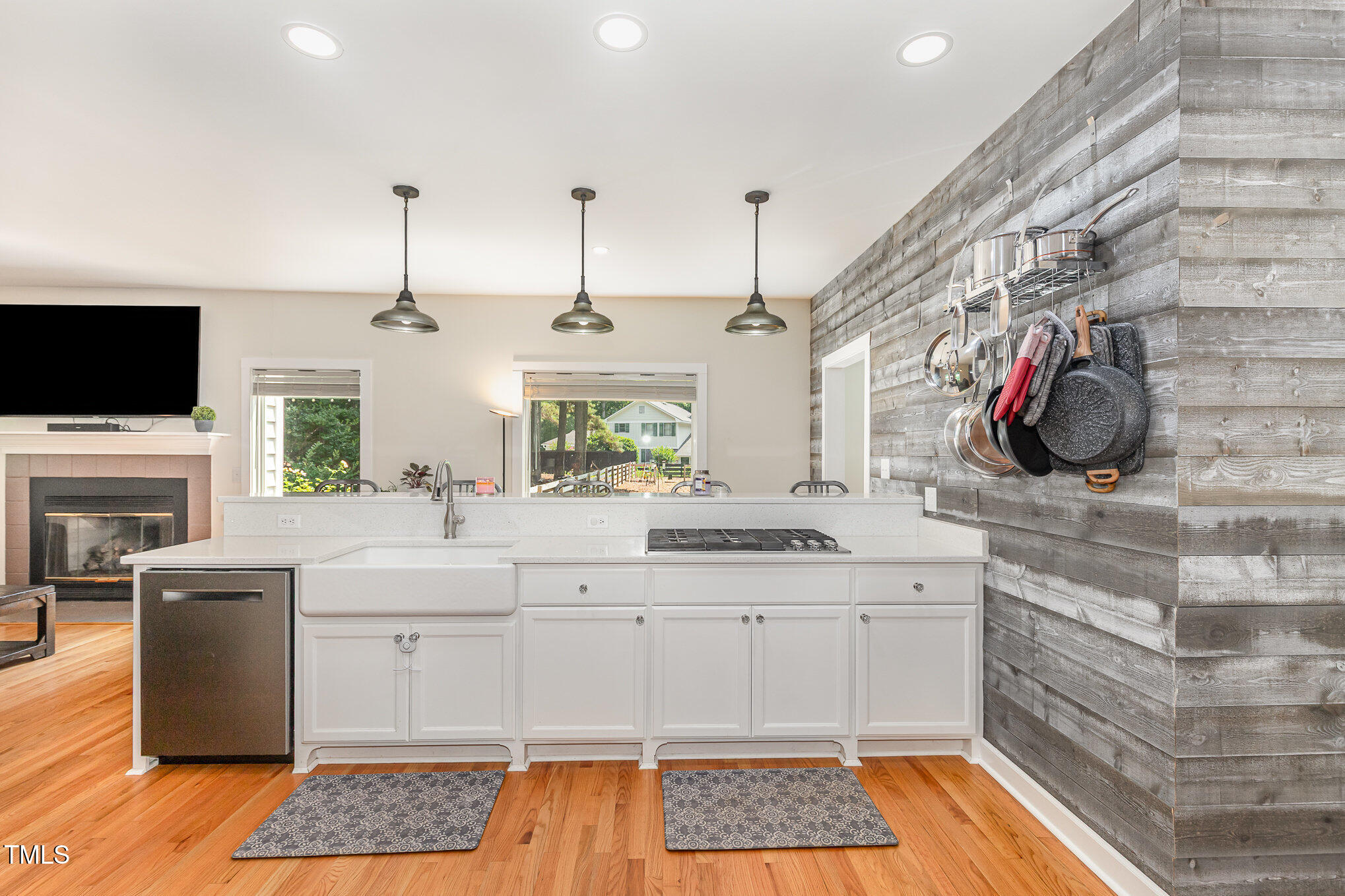 255 Morris Road Pittsboro, NC 27312 - Photo 15 of 40 a kitchen with a sink stainless steel appliances and cabinets
