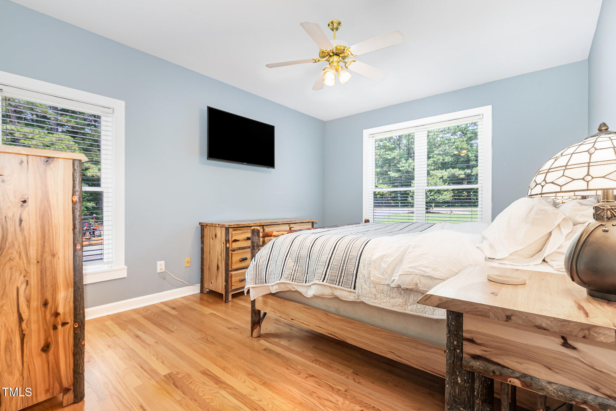 255 Morris Road Pittsboro, NC 27312 - Photo 17 of 40 a bedroom with furniture and a window