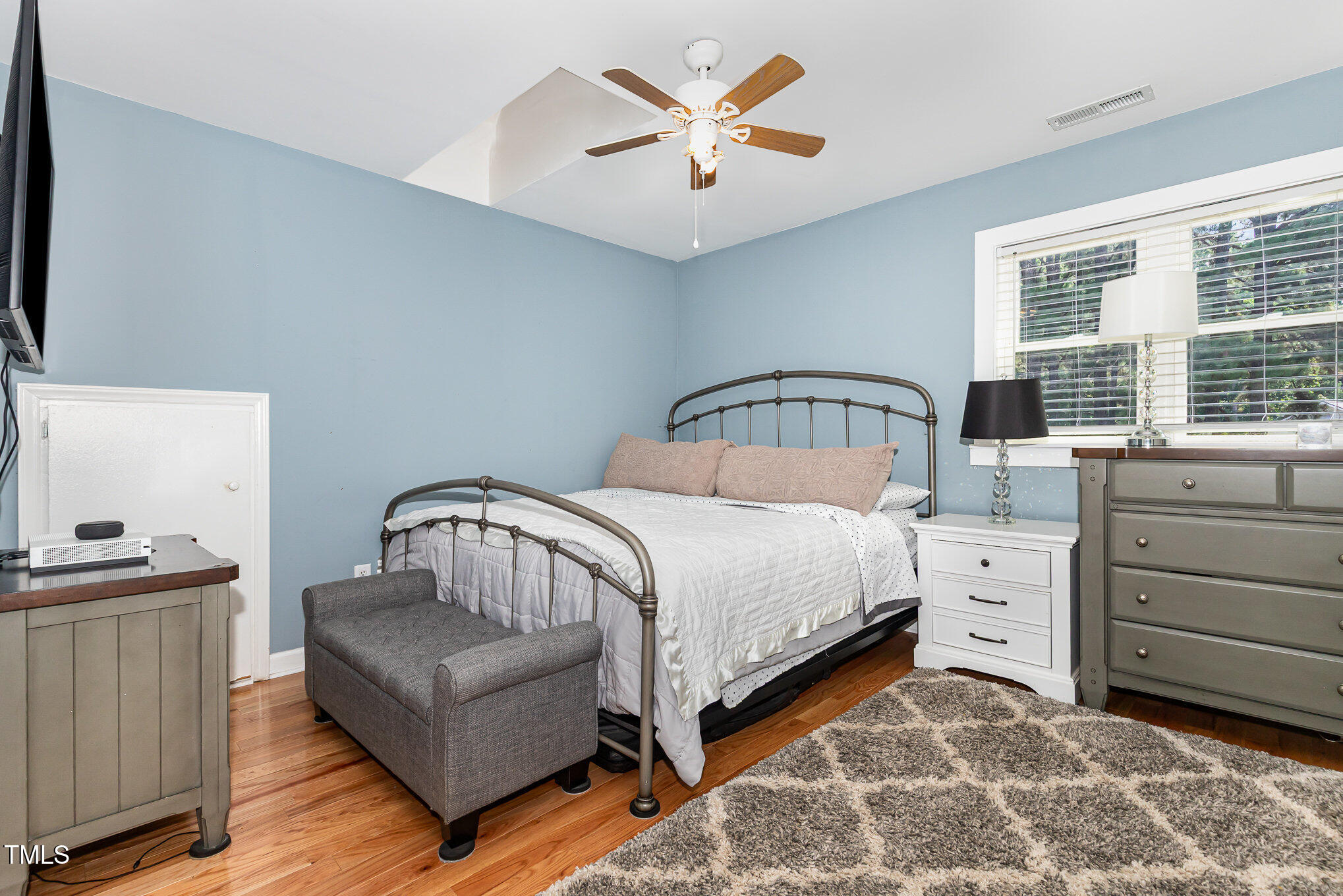 255 Morris Road Pittsboro, NC 27312 - Photo 20 of 40 a bedroom with a bed and a dresser