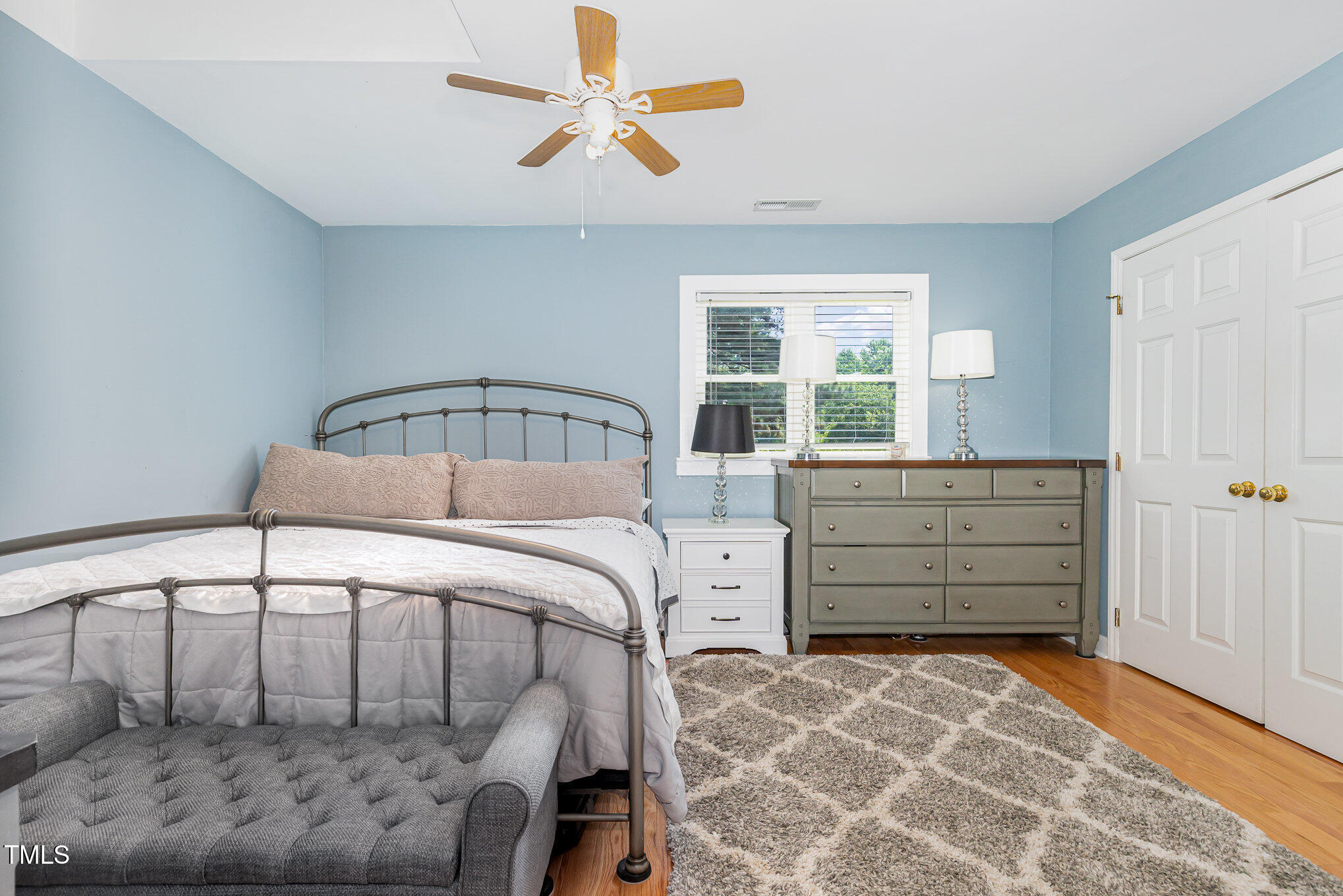 255 Morris Road Pittsboro, NC 27312 - Photo 21 of 40 a bedroom with a bed and a window