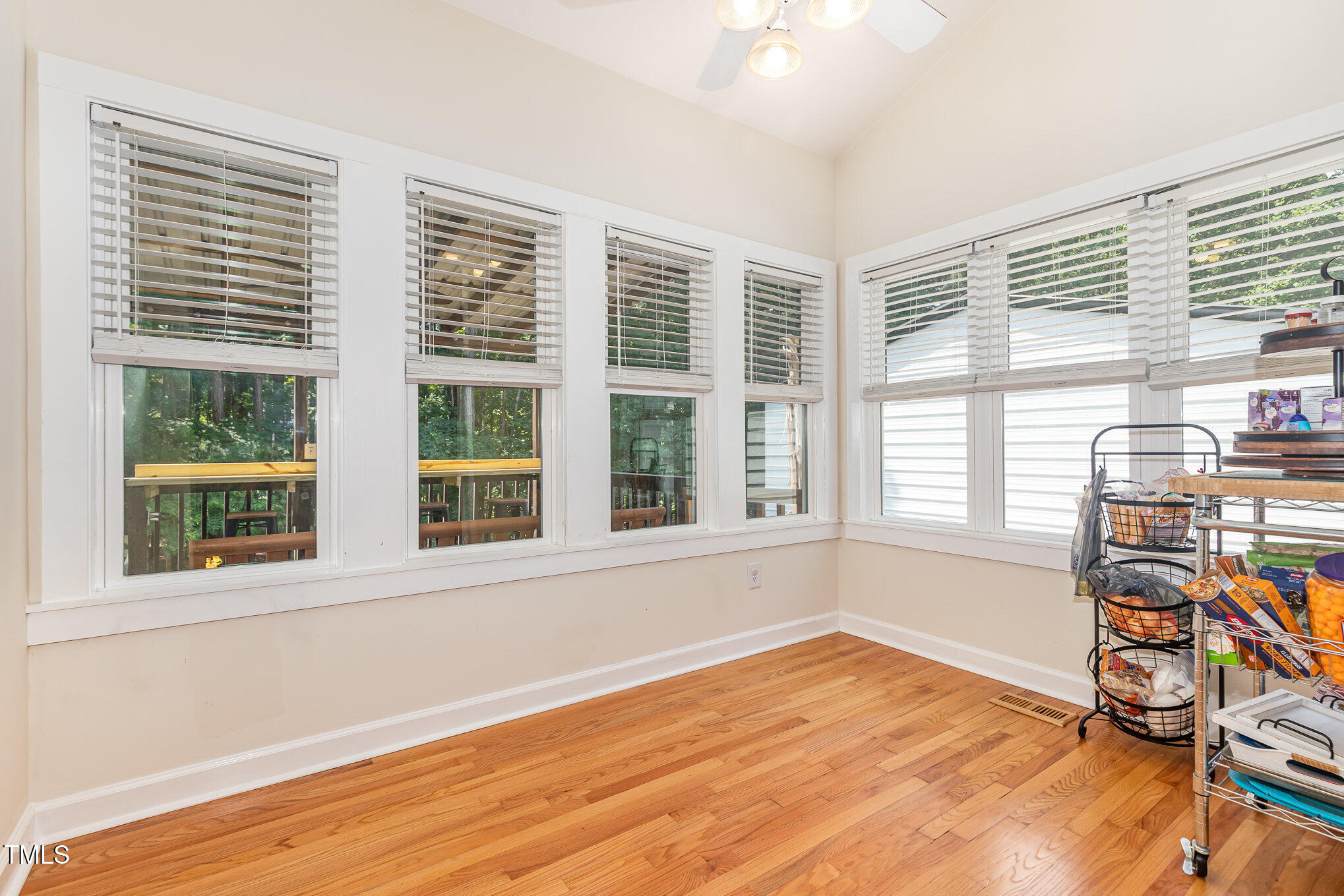 255 Morris Road Pittsboro, NC 27312 - Photo 26 of 40 a view of a room with wooden floor and windows