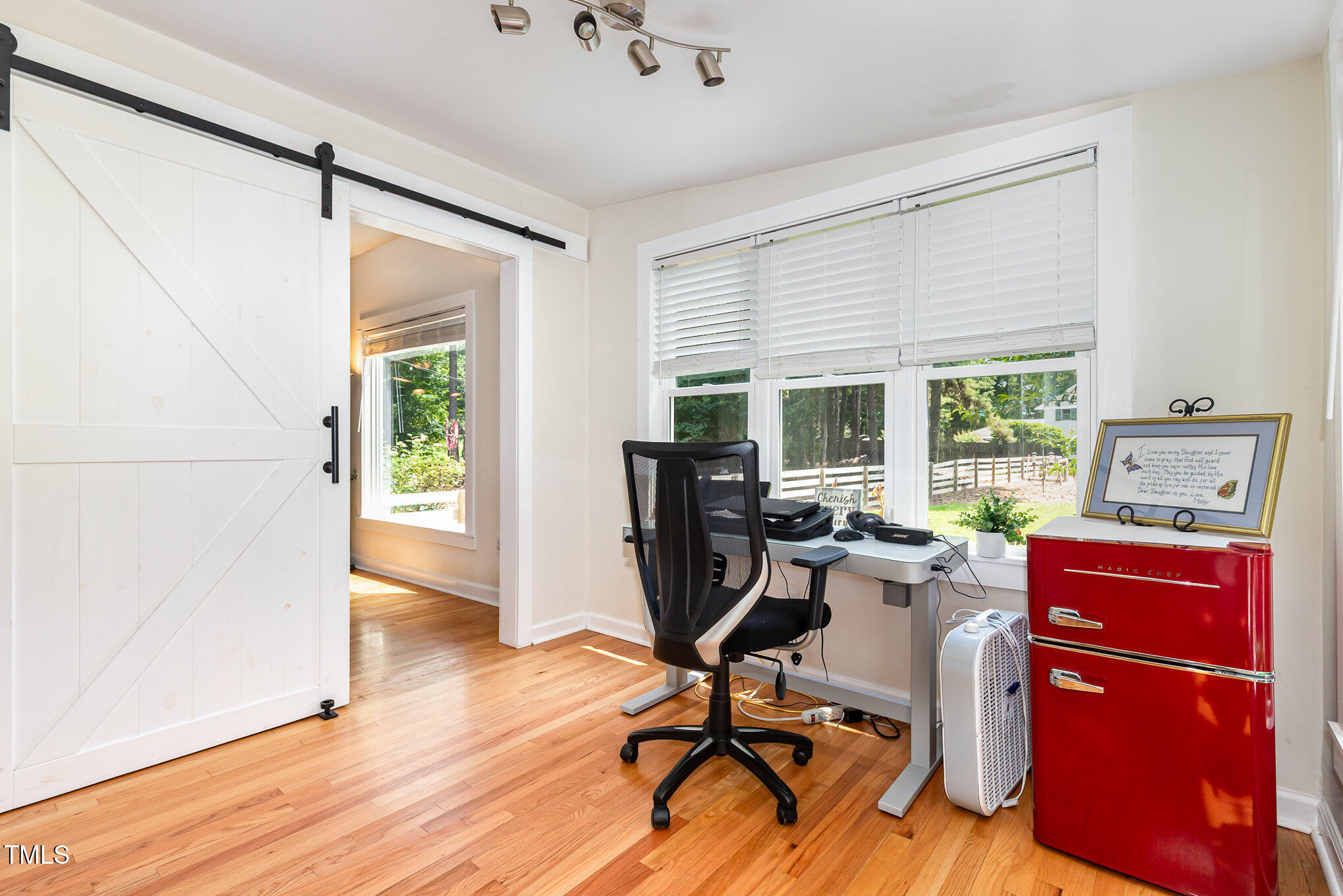 255 Morris Road Pittsboro, NC 27312 - Photo 27 of 40 a view of a workspace with furniture and a window