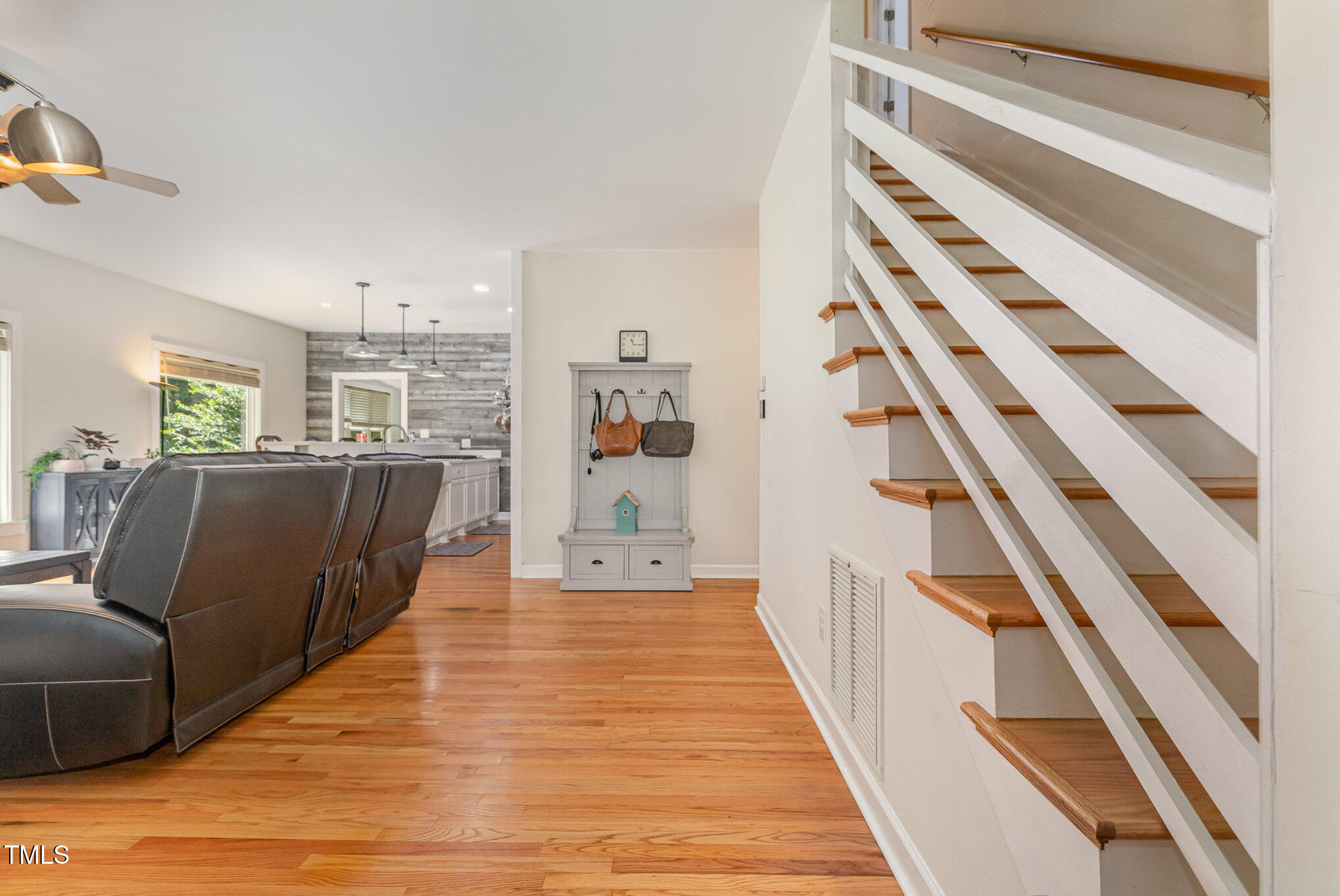 255 Morris Road Pittsboro, NC 27312 - Photo 7 of 40 a view of a living room with wooden floor and furniture