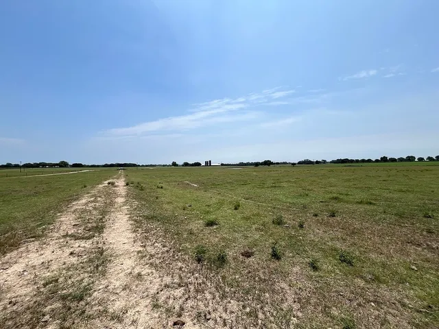 a view of a large body of water and mountain