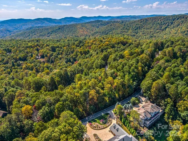 a view of a road with a yard