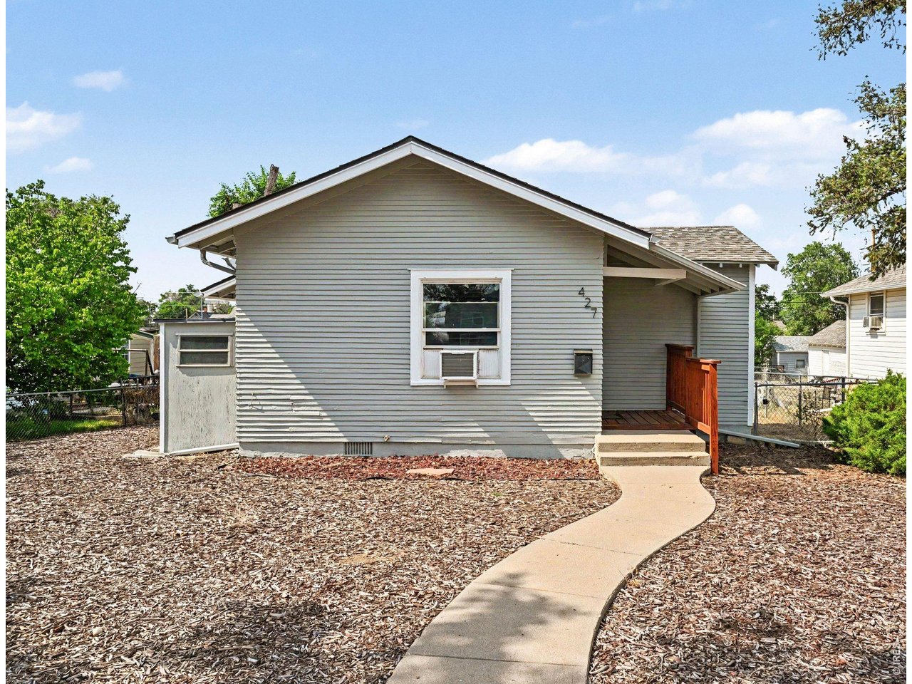 427 9th Street Greeley, CO 80631 - Photo 1 of 22 a house view with a outdoor space