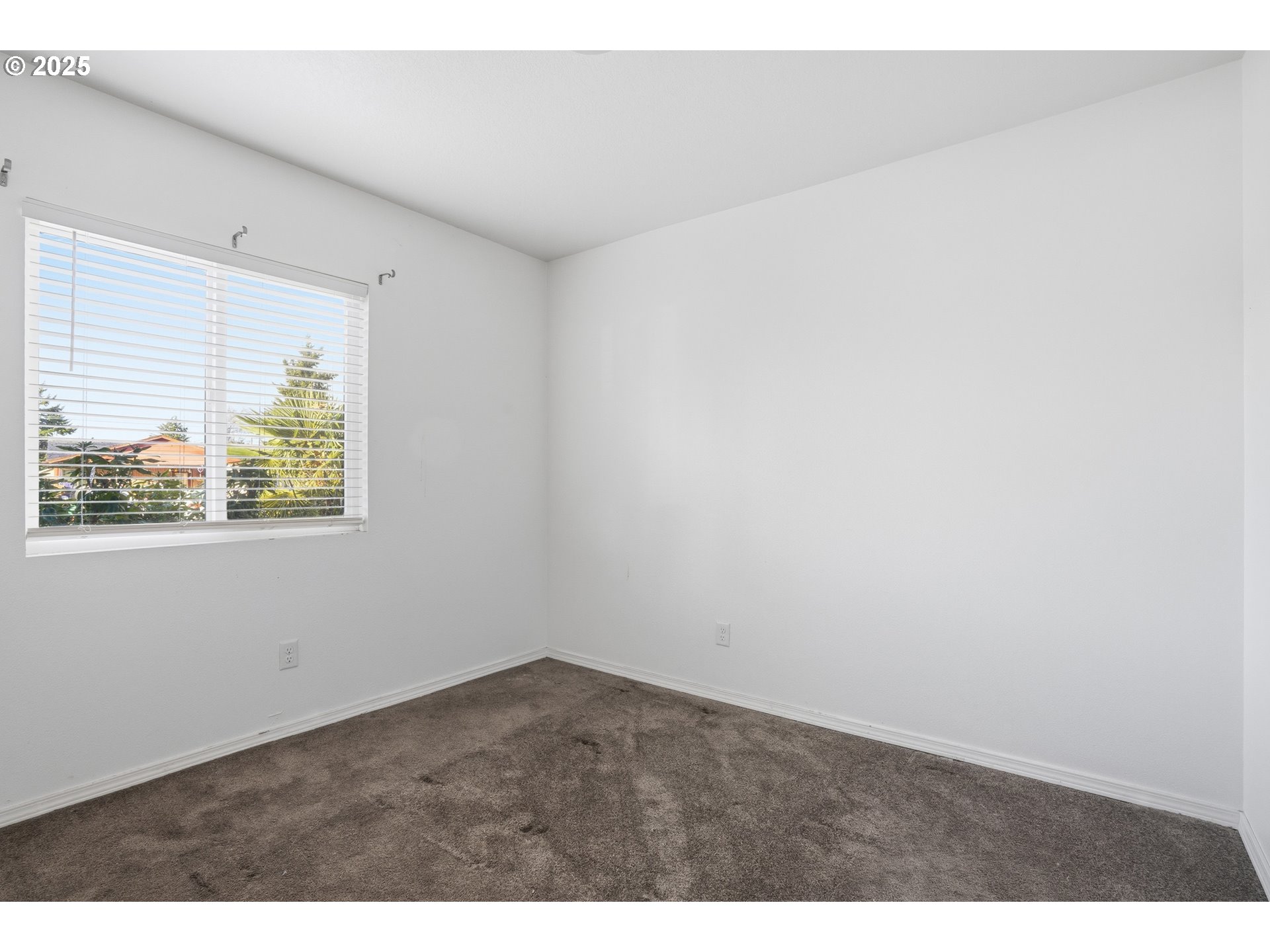 344 Douglas Street Longview, WA 98632 - Photo 14 of 29 a view of an empty room with a window