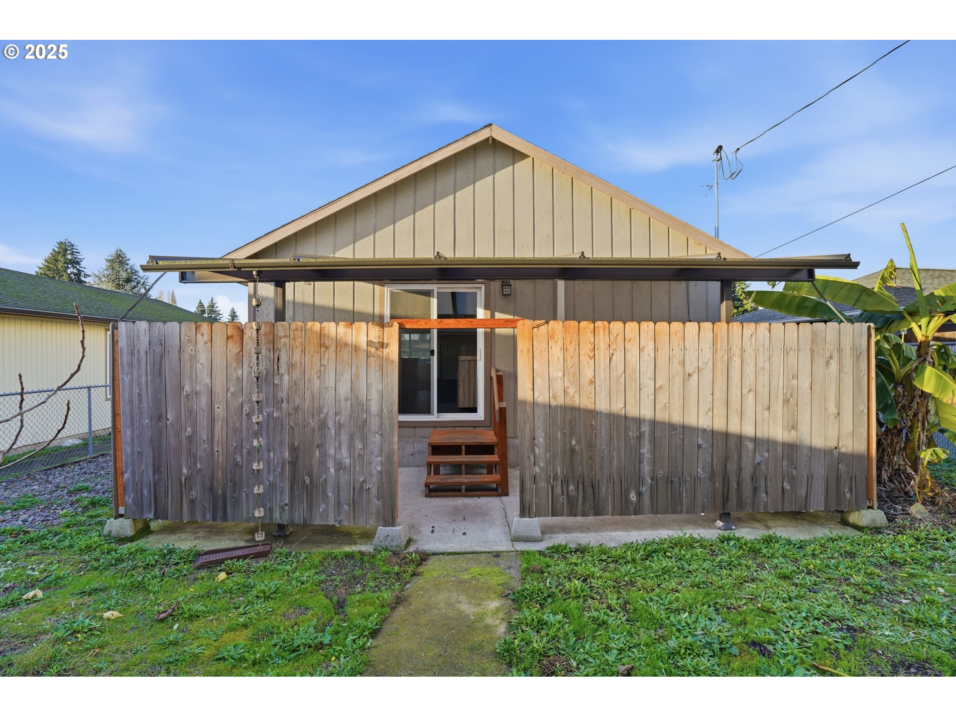 344 Douglas Street Longview, WA 98632 - Photo 22 of 29 a backyard of a house with wooden fence