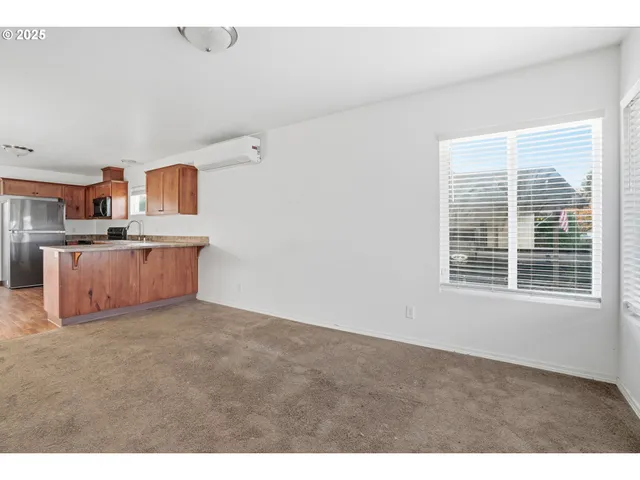 a view of kitchen and natural light