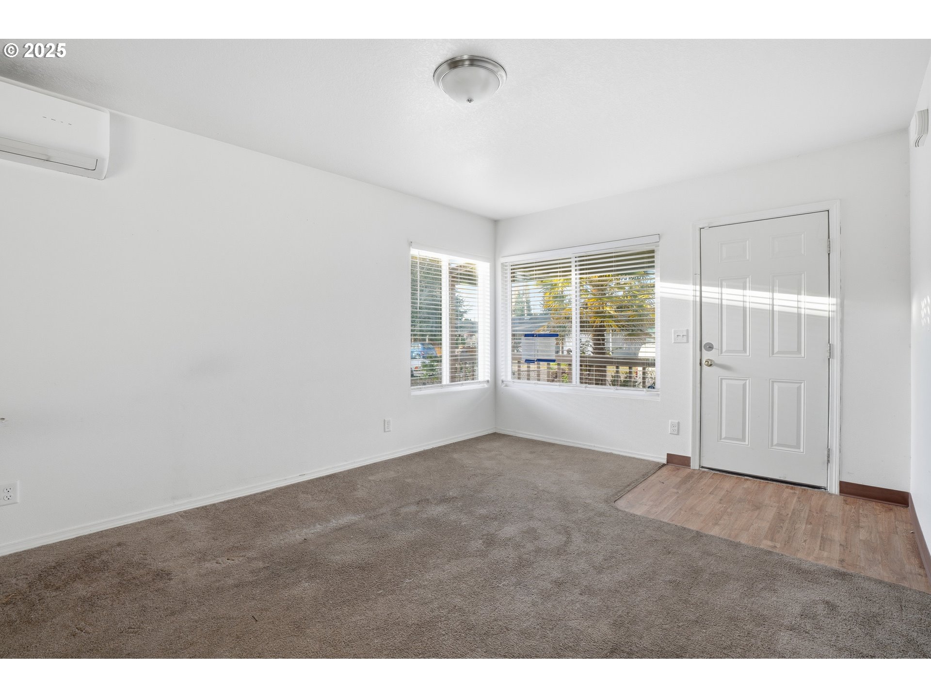344 Douglas Street Longview, WA 98632 - Photo 9 of 29 a view of an empty room with a window