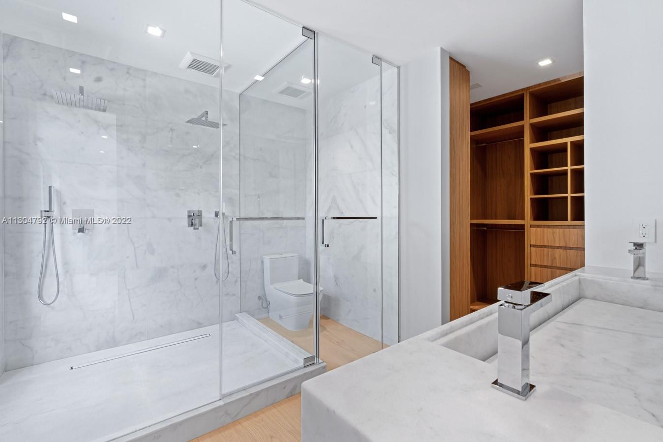 10 Pinta Road Miami, FL 33133 - Photo 28 of 52 a bathroom with a bathtub and a shower