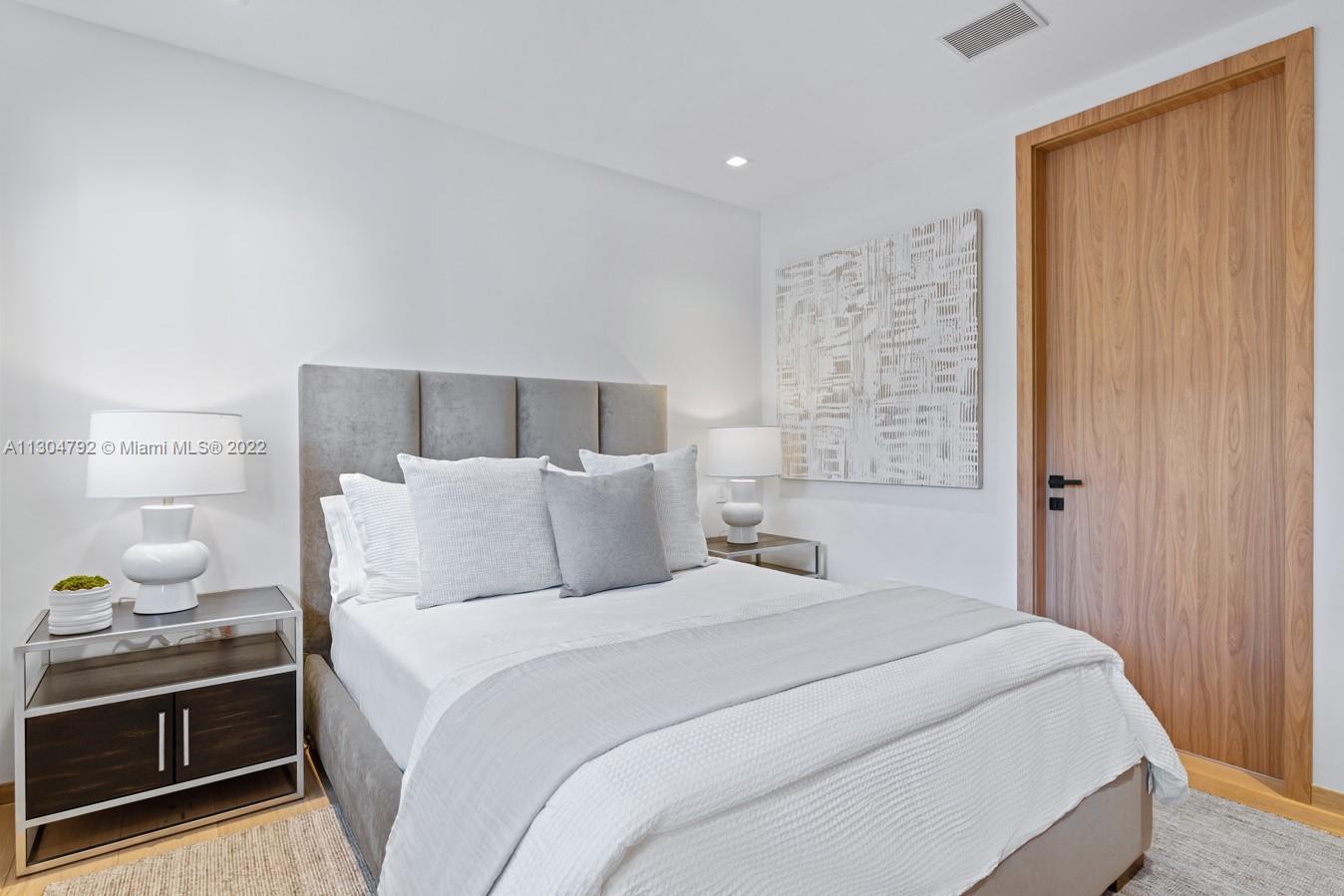 10 Pinta Road Miami, FL 33133 - Photo 39 of 52 a bedroom with a bed and a shower