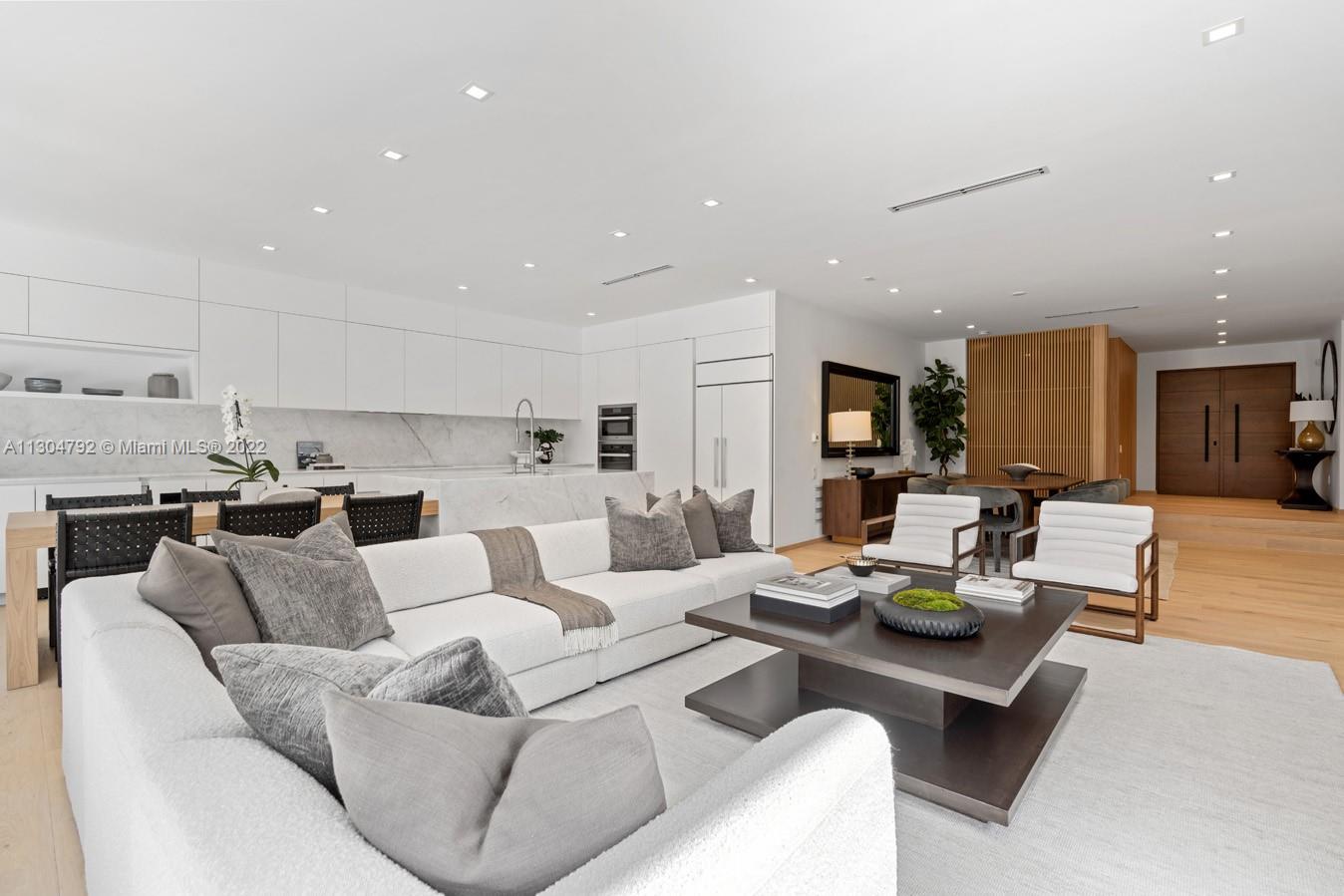 10 Pinta Road Miami, FL 33133 - Photo 48 of 52 a living room with furniture and kitchen view