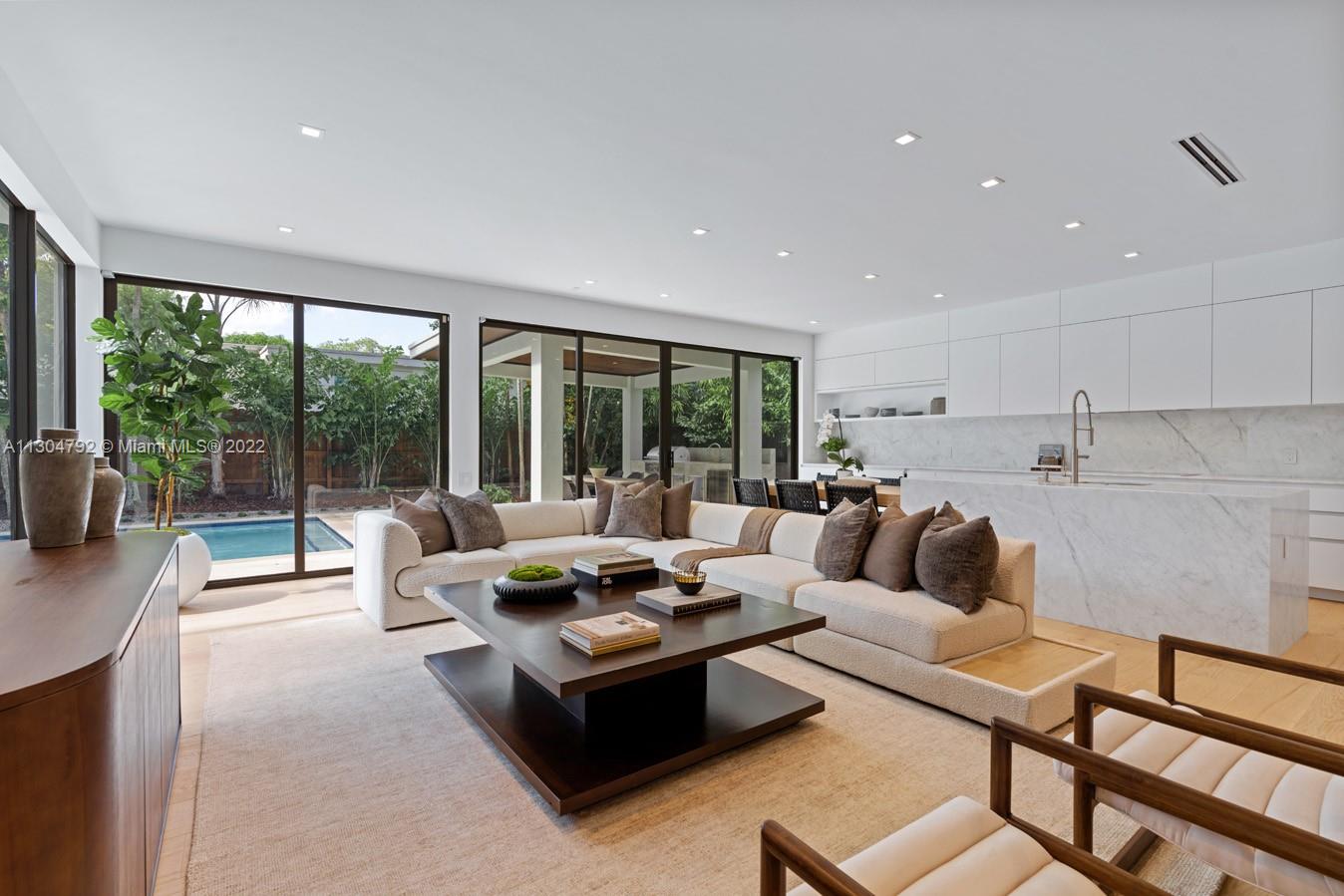 10 Pinta Road Miami, FL 33133 - Photo 50 of 52 a living room with furniture and a large window