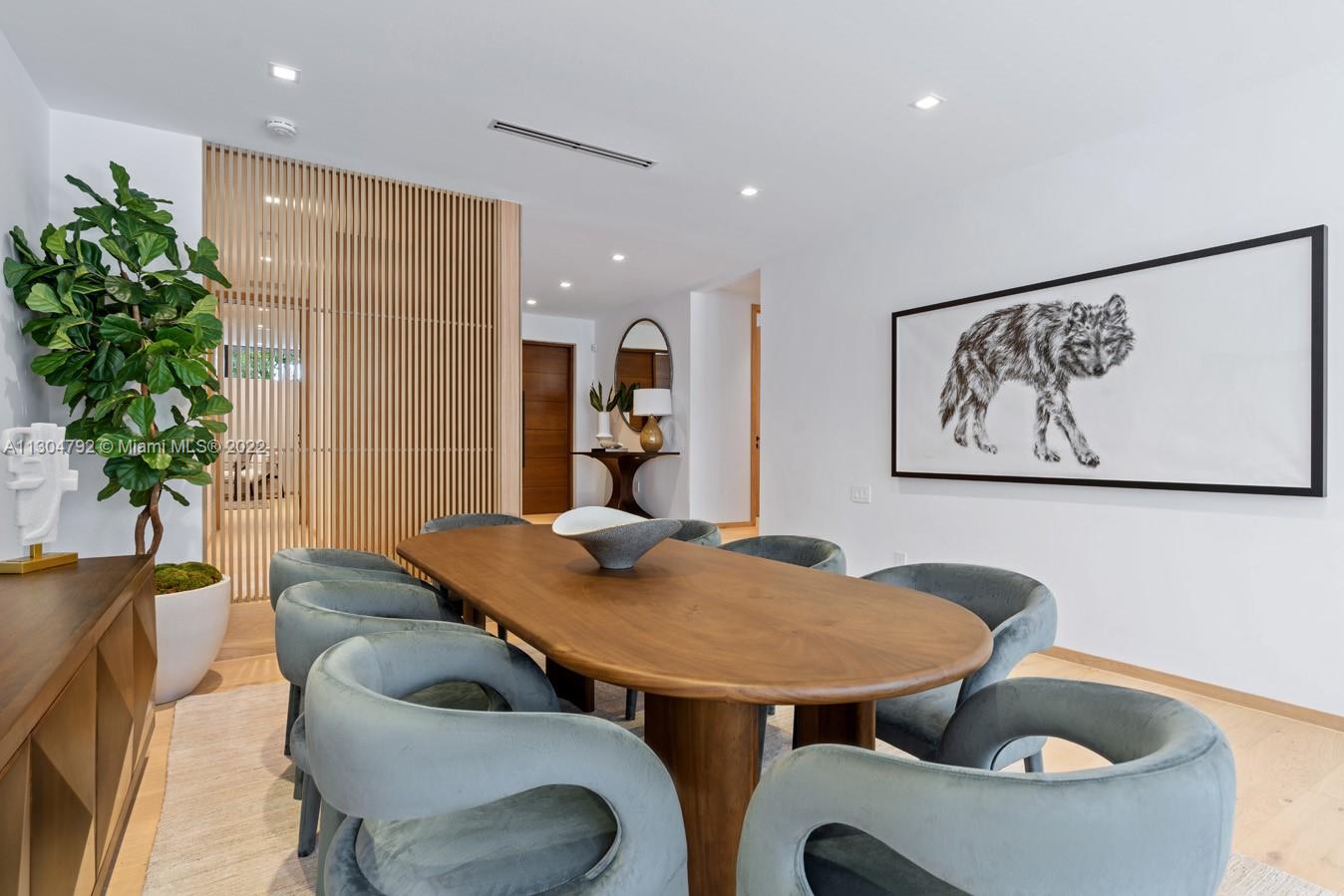 10 Pinta Road Miami, FL 33133 - Photo 51 of 52 a view of a dining room with furniture