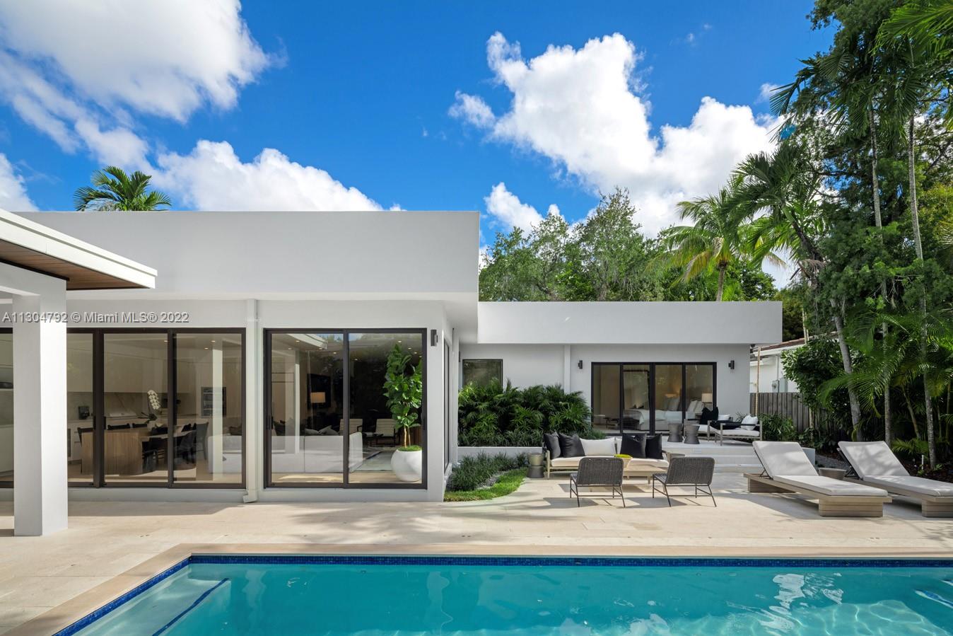 10 Pinta Road Miami, FL 33133 - Photo 9 of 52 a view of pool with outdoor seating