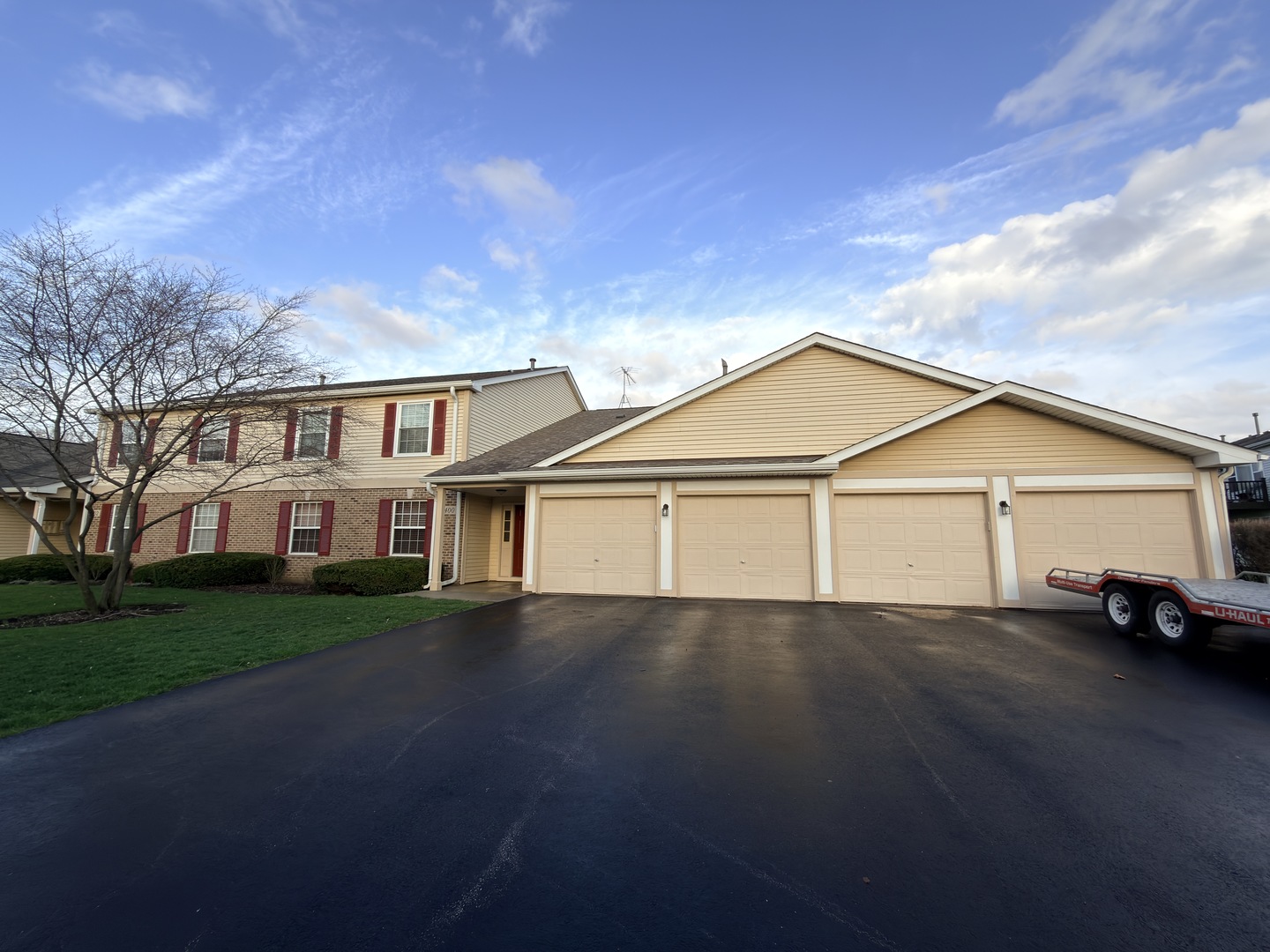 400 Woodview Circle, Unit A Elgin, IL 60120 - Photo 35 of 40 a view of house with outdoor space and parking