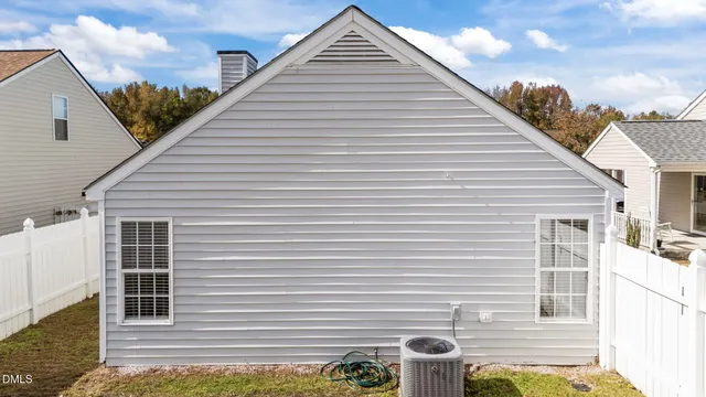 a view of a back yard of the house