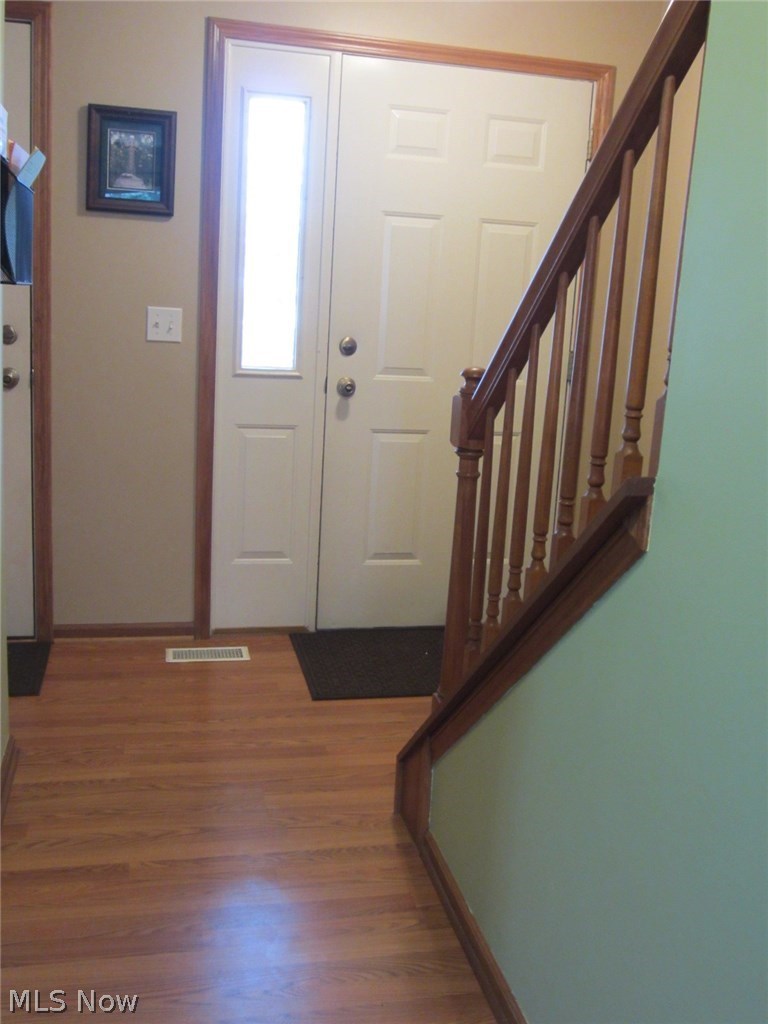 1202 Windmill Way South Avon, OH 44011 - Photo 2 of 23 Foyer with new flooring and half bath.