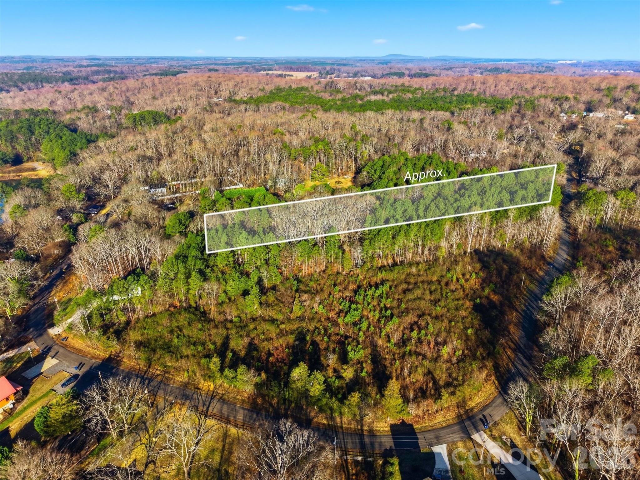 11535 Johnson-Davis Road Huntersville, NC 28078 - Photo 4 of 8 a view of a city with lots of trees